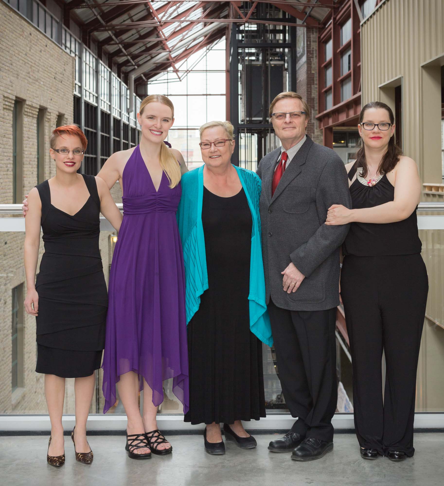 Image description: Group photo of 4 women and 1 man.